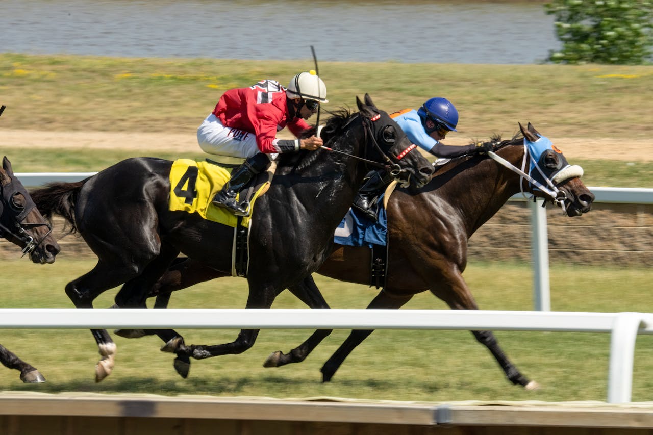 Thrilling horse racing action captured during a sunny day in Shakopee.